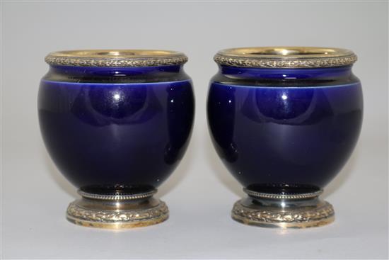 A pair of French silver mounted blue glazed porcelain vases, by Risler & Carre of Paris, 4.25in.